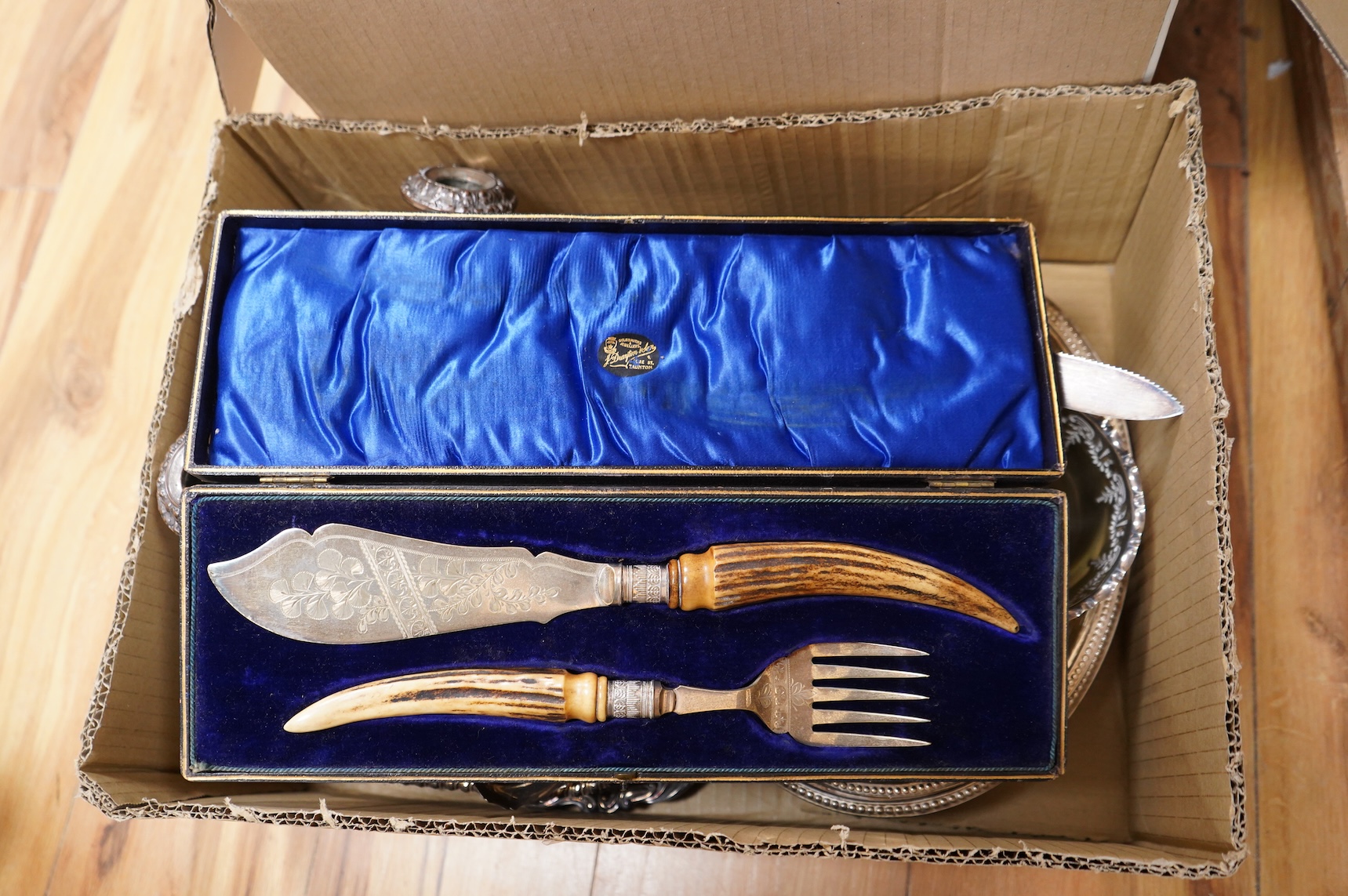 Assorted plated wares including pair of dwarf candlesticks, two pairs of entrée dishes, cased horn handled servers, set of flower holders, bread knife, mustard pot, salver, silver coins, two ceramic toby jugs, four pewte